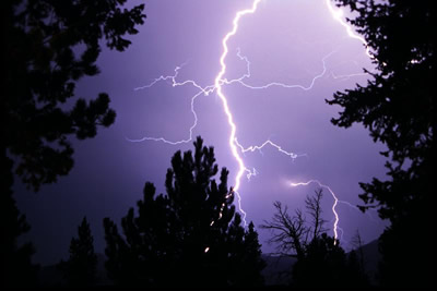 <a
  href="/earth/Atmosphere/tstorm/tstorm_lightning.html&edu=elem&dev=1/earth/Atmosphere/moons/triton_atmosphere.html">Lightning</a>
  is the most spectacular element of a <a
  href="/earth/Atmosphere/tstorm.html&edu=elem&dev=1/earth/Atmosphere/moons/triton_atmosphere.html">thunderstorm</a>.
  A single stroke of lightning can <a
  href="/earth/Atmosphere/temperature.html&edu=elem&dev=1/earth/Atmosphere/moons/triton_atmosphere.html">heat</a>
  the air around it to 30,000 degrees Celsius (54,000 degrees Fahrenheit)! This
  extreme heating causes the air to expand explosively. The expansion creates a
  shock wave that turns into a booming <a
  href="/earth/Atmosphere/tstorm/lightning_thunder.html&edu=elem&dev=1/earth/Atmosphere/moons/triton_atmosphere.html">sound
  wave</a>, better known as thunder.<p><small><em> Image Courtesy of University Corporation for Atmospheric Research/Carlye Calvin</em></small></p>