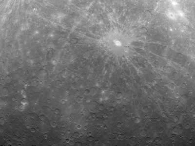 This historic image is the first ever taken from a spacecraft in orbit about <a href="/mercury/mercury.html">Mercury</a>, the innermost planet of the solar system.  Taken on 3/29/2011 by <a href="/space_missions/robotic/messenger/messenger.html">MESSENGER</a>, it shows numerous craters across the <a href="/mercury/Interior_Surface/Surface/surface_overview.html">surface</a> of the planet.  Temperatures there can reach over 800F because Mercury is so close to the Sun and rotates so slowly.  MESSENGER entered orbit around Mercury earlier in March 2011.<p><small><em>NASA/Johns Hopkins University Applied Physics Laboratory/Carnegie Institution of Washington</em></small></p>