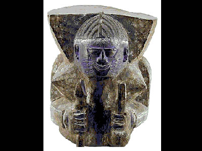 <a href="/mythology/shango_storm.html&dev=1/earth/Atmosphere/moons/triton_atmosphere.html">Shango</a> was the forth king of the ancient Oyo Empire, the West African center of culture and politics for the Yoruba people.After his death, he became known as the god of <a href="/earth/Atmosphere/tstorm/tstorm_lightning.html&dev=1/earth/Atmosphere/moons/triton_atmosphere.html">thunder and lightning</a>. In artwork, such as this wood carving, he is often depicted with a double ax on his head, the symbol of a thunderbolt, or he is depicted as a fierce ram.<p><small><em>Image Courtesy of the Hamill Gallery of African Art, Boston, MA</em></small></p>
