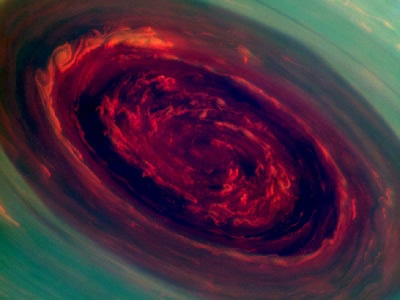 The spinning vortex of <a href="https://www.windows2universe.org/saturn/saturn.html">Saturn</a>'s north polar storm resembles a giant deep red rose surrounded by green foliage in this false-color <a href="http://www.nasa.gov/mission_pages/cassini/multimedia/pia14944.html">image</a> from NASA's <a href="https://www.windows2universe.org/missions/cassini.html">Cassini spacecraft</a>. The eye is 2,000 kilometers across with cloud speeds as fast as 150 meters per second.
It is not known how long this newly discovered north-polar <a href="https://www.windows2universe.org/earth/Atmosphere/hurricane/hurricane.html">hurricane</a> has been active.
The view was acquired at a distance of approximately 419,000 kilometers from Saturn.<p><small><em>NASA/JPL-Caltech/SSI</em></small></p>