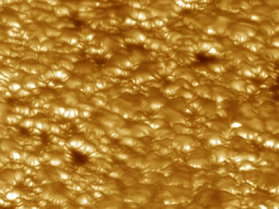 The "surface" of the Sun (the <a href="/sun/atmosphere/photosphere.html&edu=high&dev=1/earth/Atmosphere/moons/triton_atmosphere.html">photosphere</a>) is covered with a "granulation pattern" caused by the convective flow of heat rising to the photosphere from the <a href="http://www.windows2universe.org/sun/solar_interior_new.html">Sun's interior</a>. The granulation pattern is similar to what you see when you look at the top of a pot of boiling oatmeal. Note how the hotter centers of granules bulge upward, while the cooler edges are sinking downward.<p><small><em> Image courtesy of Goran Scharmer and Mats G. Lfdahl of the Royal Swedish Academy of Sciences</em></small></p>